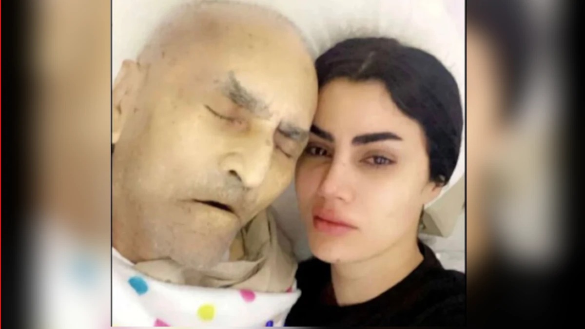 صور كادي القيسي مع جثمان والدها المثيرة للجدل - تفاصيل